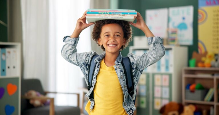 Child,,Face,And,Book,On,Head,In,School,Classroom,For